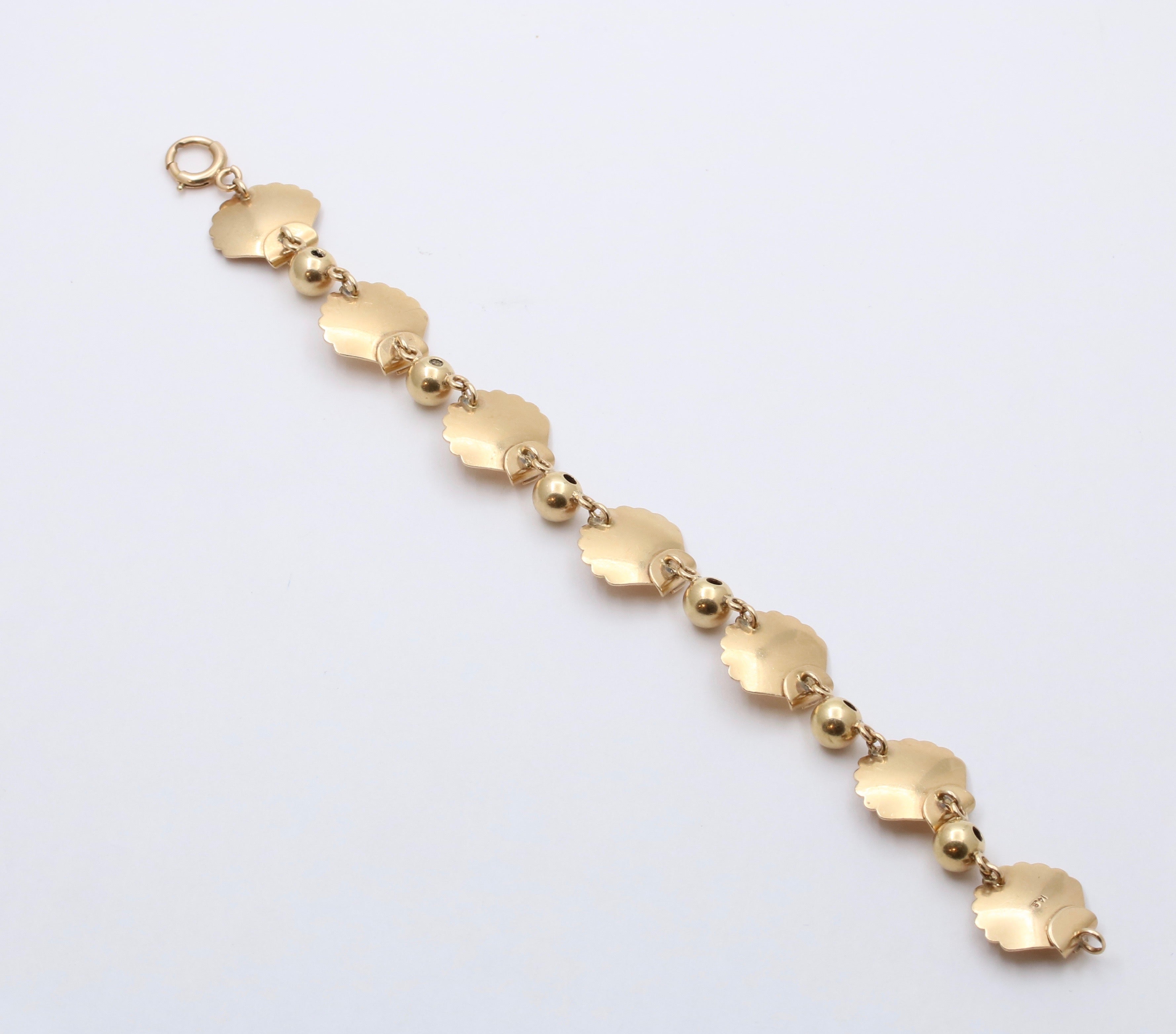 Gold on sale shell bracelet