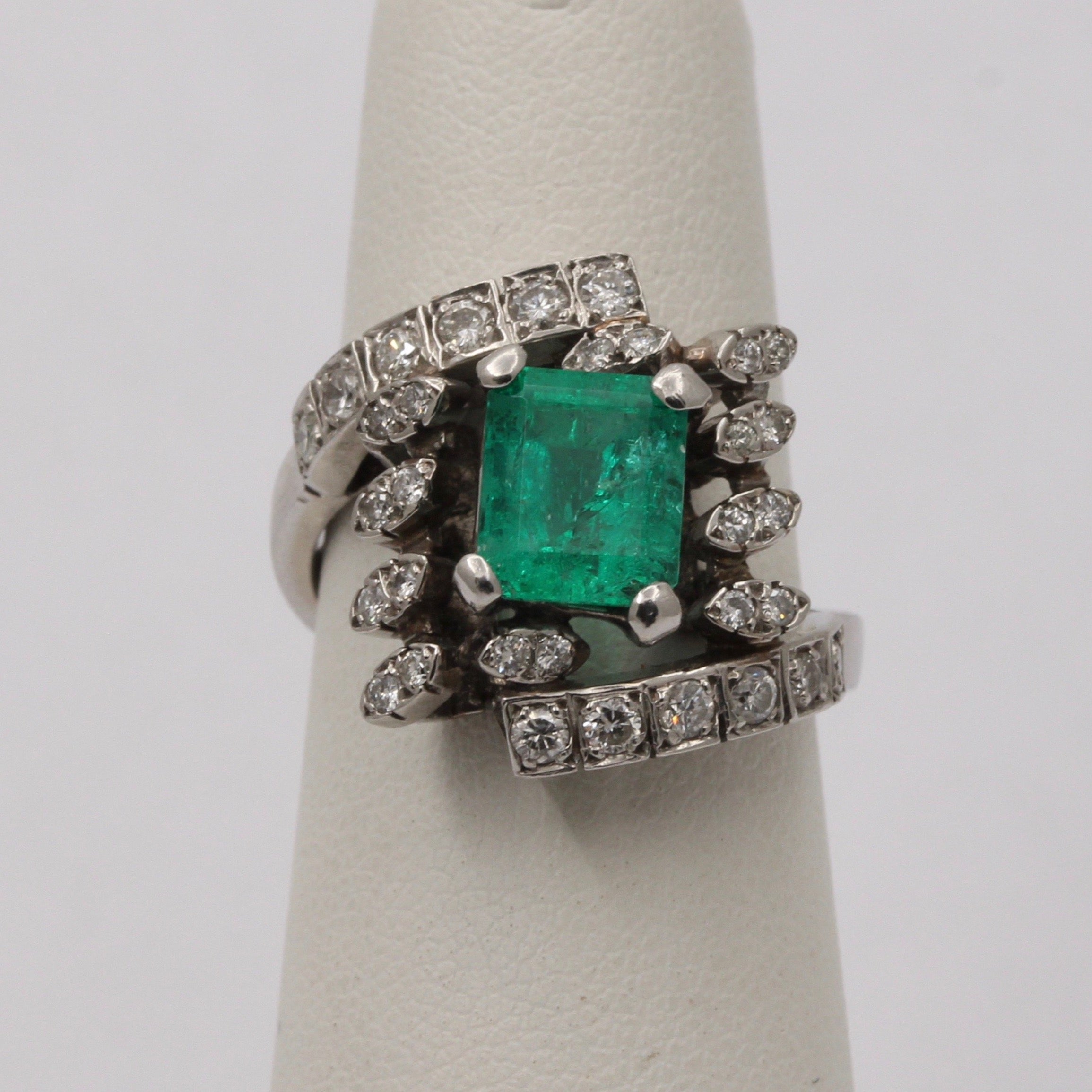 Emerald and diamond cocktail on sale ring